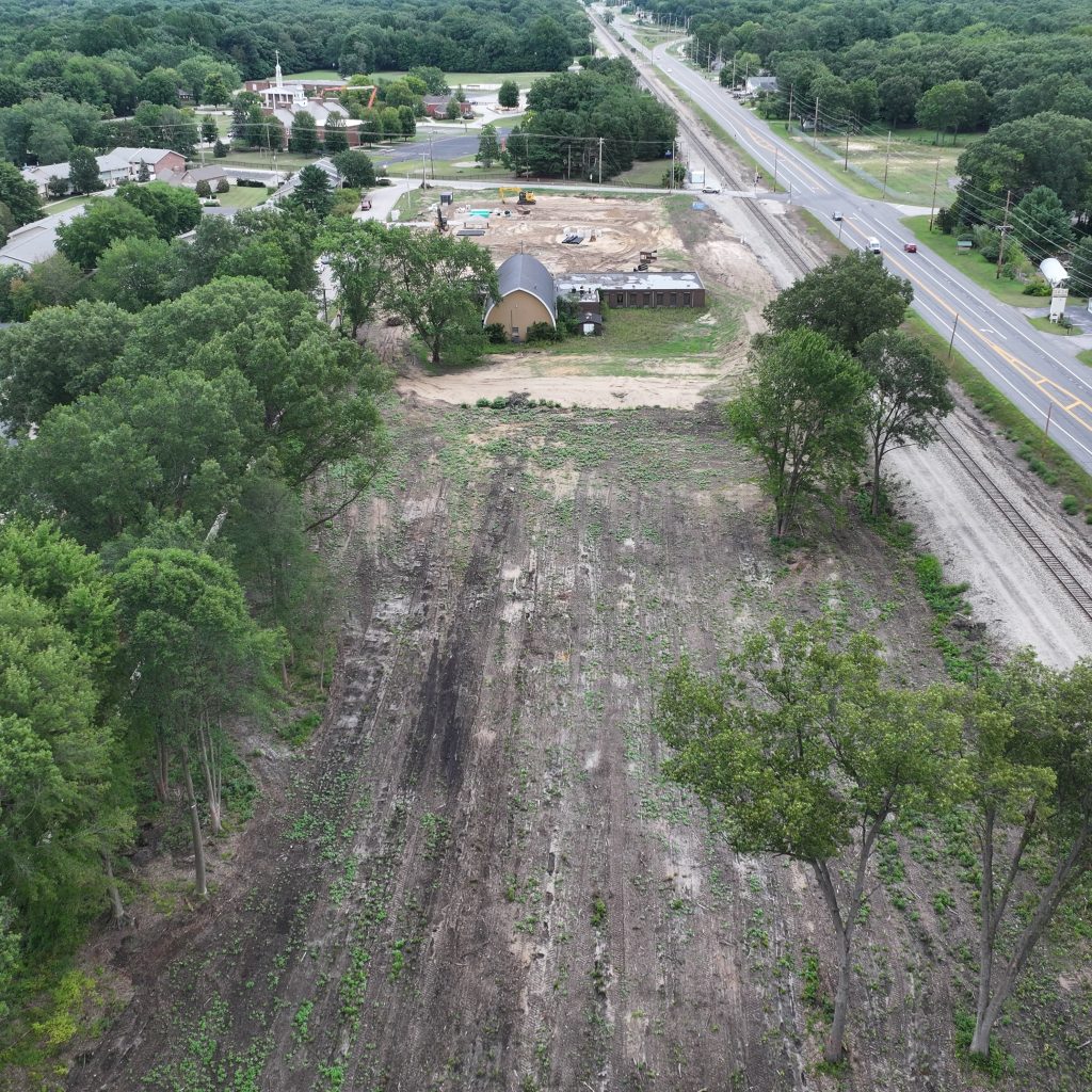 drone shot of St. Andrew's by the Lake in Michigan City with land cleared for new development
