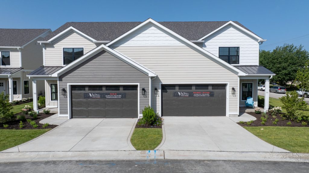 11 and 13 Moorebrooke Rd Michigan City, IN The Dunehaven Model Home duplex townhome exterior drone shot