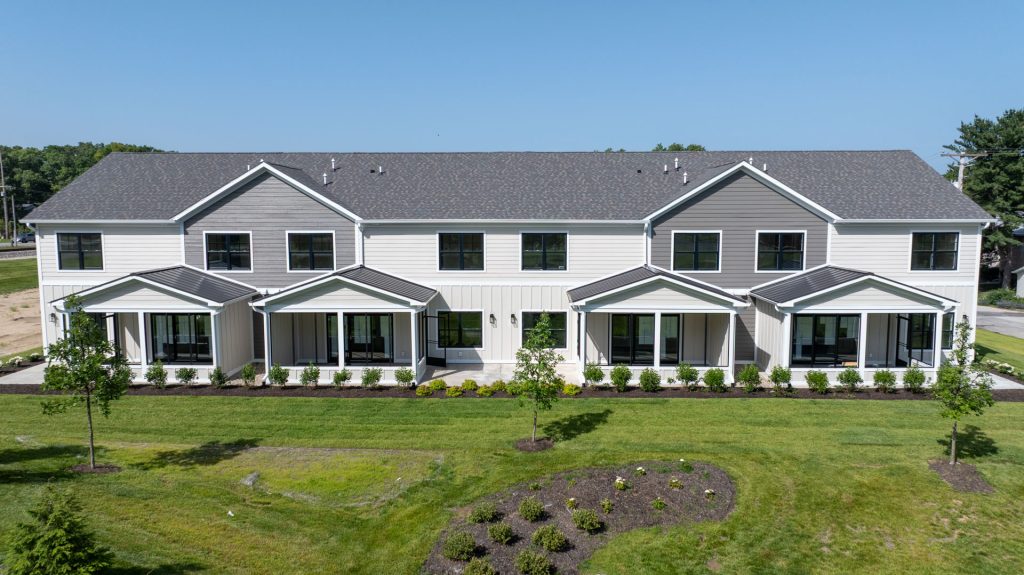 10, 12, 14, 16 11 and 13 Moorebrooke Rd Michigan City, IN The Dunehaven townhouses exterior drone shot with 3-seasons rooms and patios